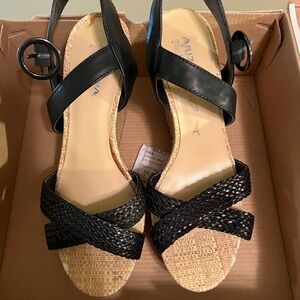 Black and tan wedge heels with adjustable ankle strap